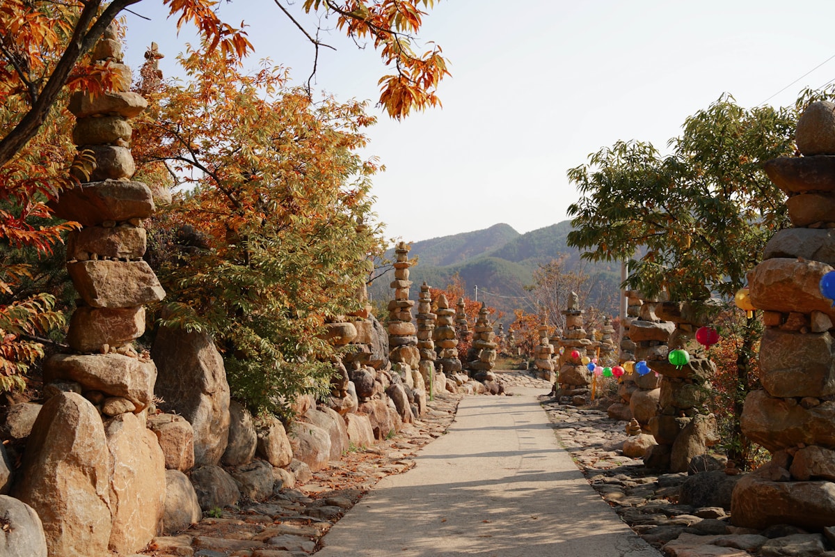 Long-distance trail winding through forested ridge with mountain peaks in the background, South Korea