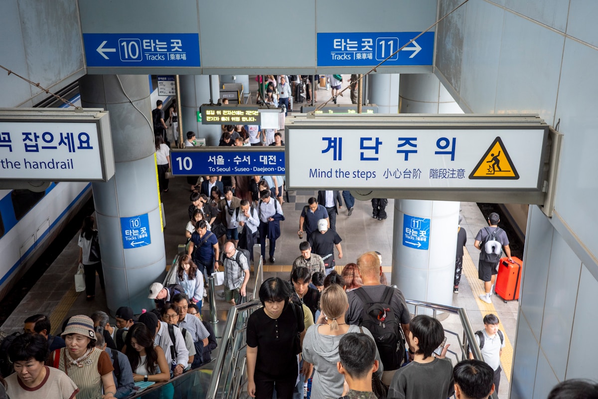 People walking through a subway entrance in South Korea