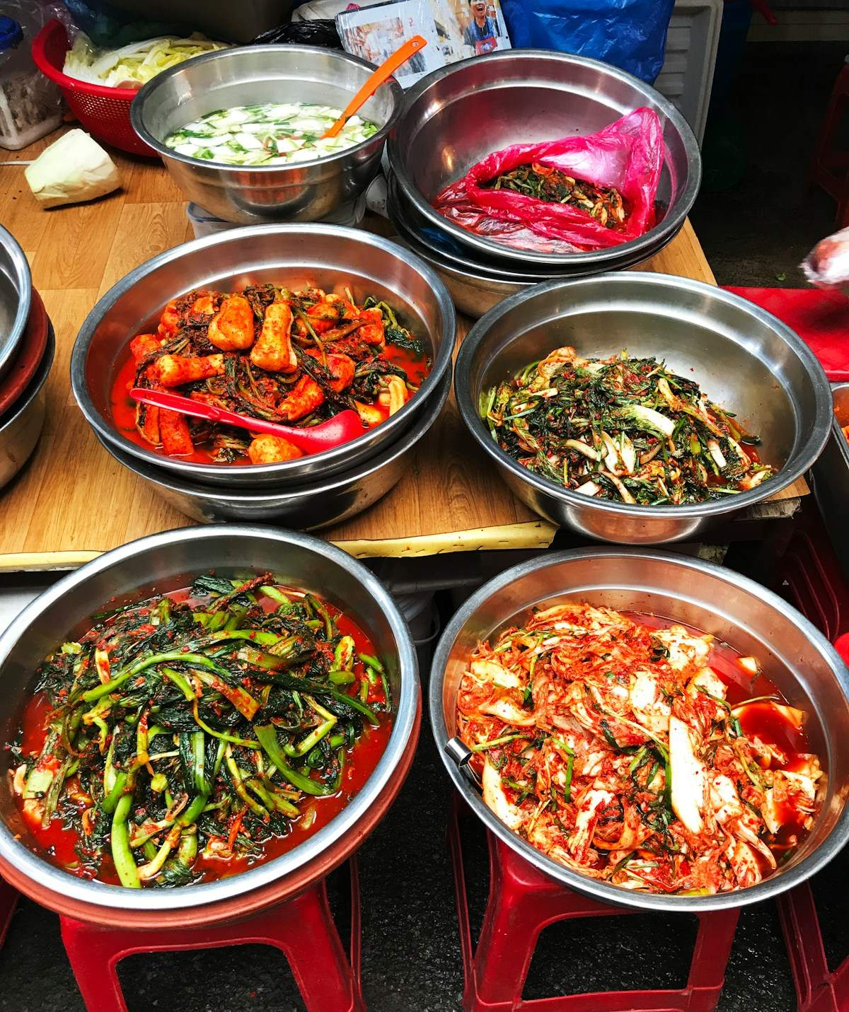 Assorted Korean vegetable banchan dishes in silver bowls, South Korea
