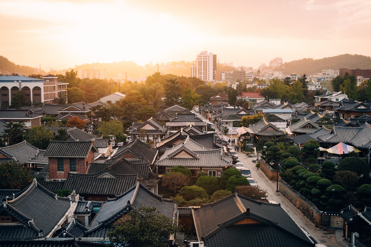 Traditional tile-roofed guesthouse near Gyeongju's royal tombs at dusk