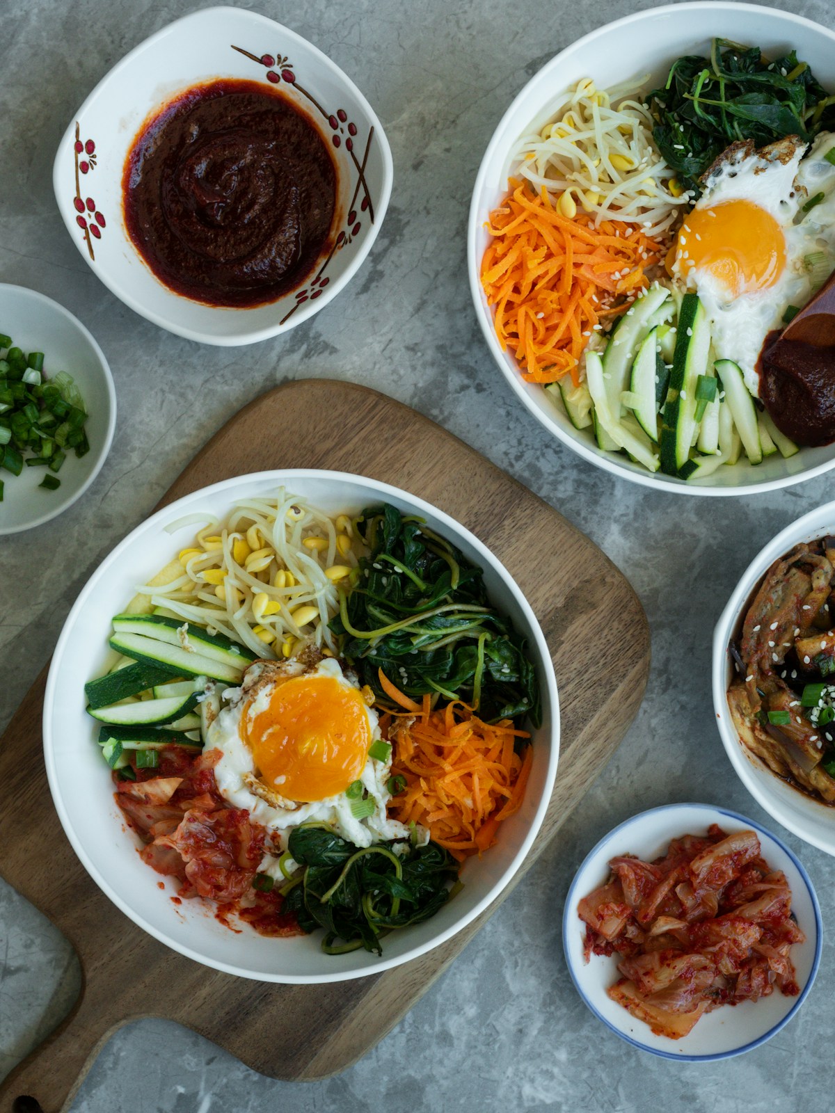 A stone pot dolsot bibimbap with colourful toppings served in Jeonju