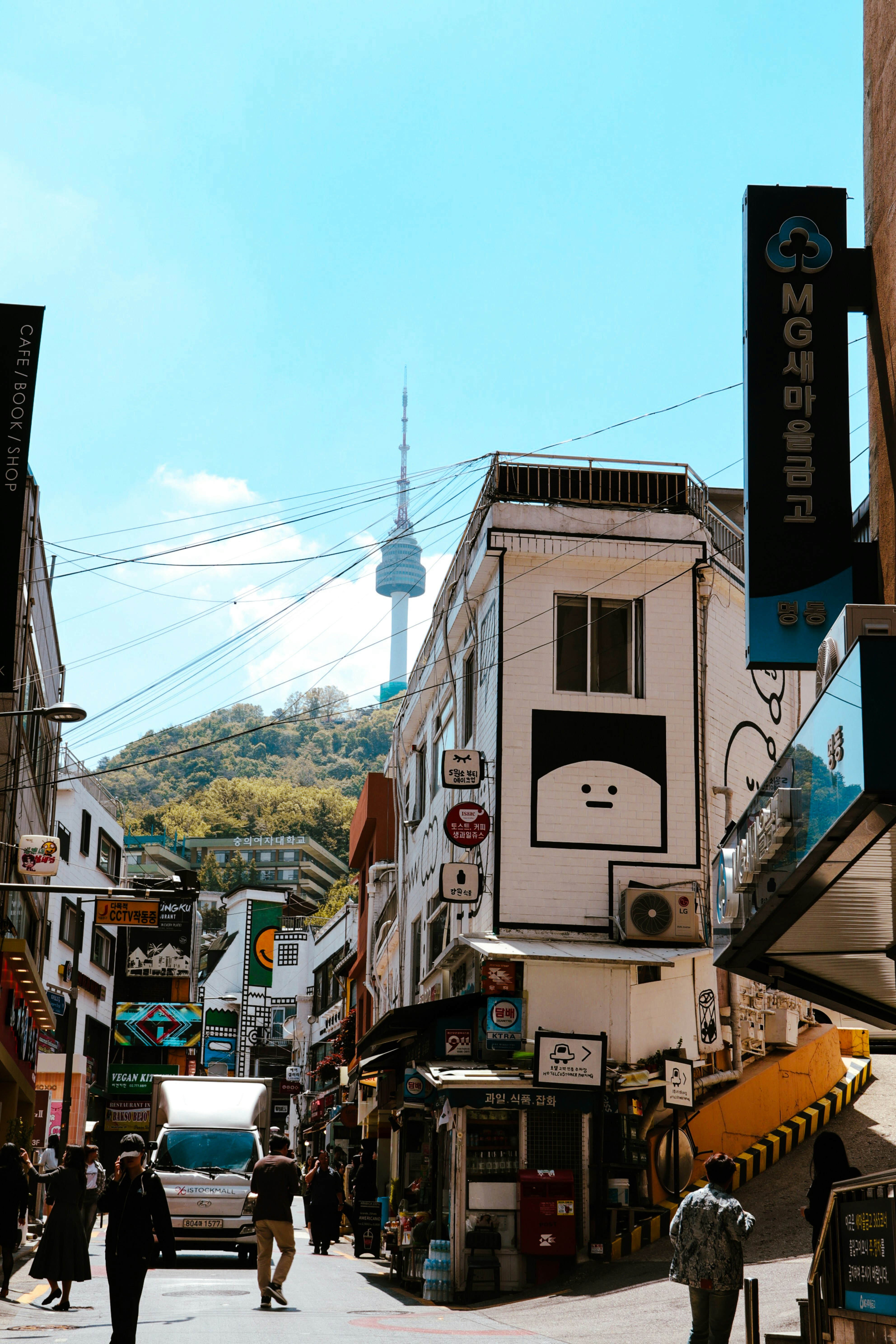 Busy Seoul street with N Seoul Tower visible in the background, South Korea